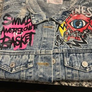 Graphic Denim Jacket with Pink and Red Accents